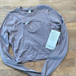 LA better best long sleeve cropped length tight fit with key hole cut out.